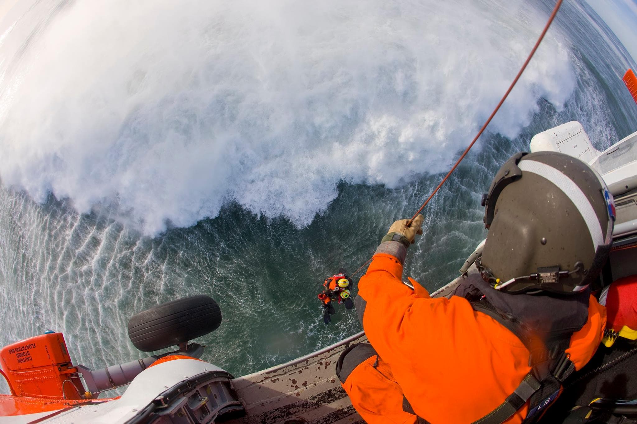Helicopter rescue operation over open water