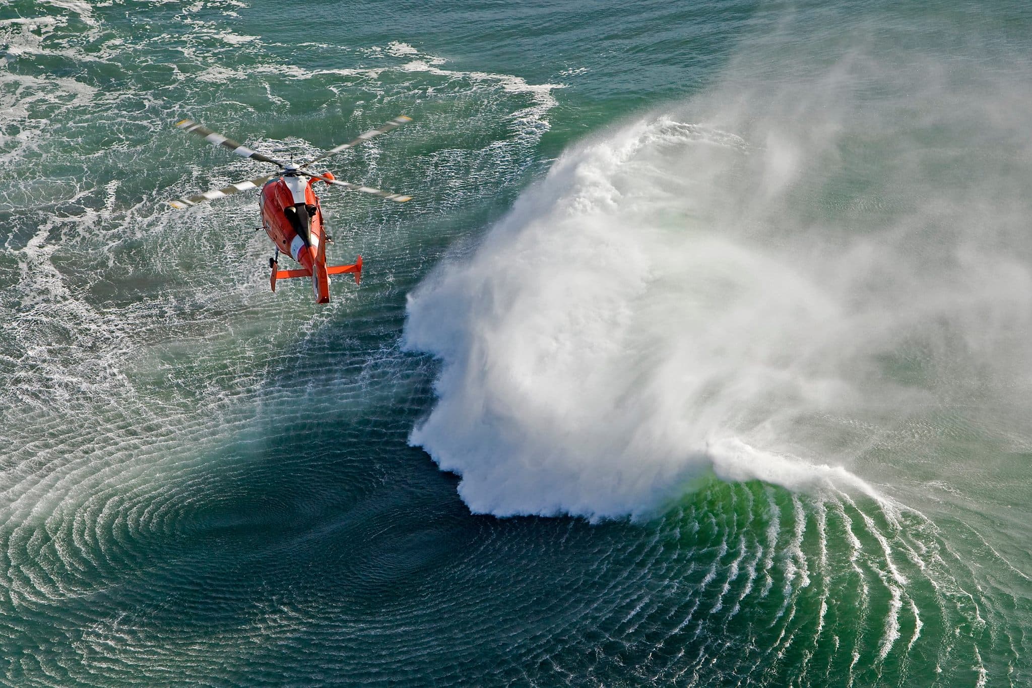 Helicopter crew operating in high surf conditions